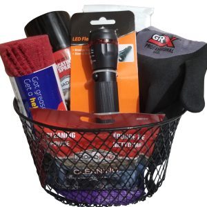 The Automotive Basket contains various automotive essentials, including a red LED flashlight, a black can of lubricating spray, a red cloth, black gloves, and packaged cleaning sponges.