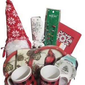 Consider gifting the Automotive Basket this holiday season; it's filled with Christmas-themed items, including two mugs, a gnome with a red hat, decorative plates, a candle, a necklace, coasters, and a framed red snowflake. The basket showcases designs featuring cardinals, snowflakes, and Christmas trees.