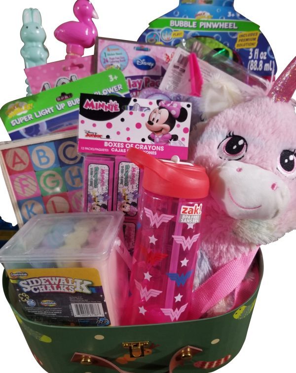 An Automotive Basket filled with various colorful toys and items, including a plush unicorn, alphabet blocks, a Minnie Mouse box of crayons, a Wonder Woman water bottle, sidewalk chalk, bubble sticks, a bubble pinwheel, and flamingo-shaped items is perfect for any child's delight.