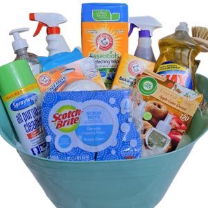 The Automotive Basket is a light green basket packed with an assortment of cleaning products, including disinfecting wipes, all-purpose cleaner, dish soap, spray cleaners, scrub brushes, citrus air freshener, and baking soda. The arrangement ensures that all items are visible and ready for use—mirroring a toolkit of cleanliness.