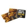 Two BW3's gift cards are overlapping. The top card is labeled "NEXT ONE'S ON US," and both cards display an image of chicken wings with dipping sauce in the background. Each card features the Buffalo Wild Wings logo in the bottom right corner. Perfect for adding to your BW3's Kitchen & Home Basket, which includes $50 in BW3's Gift Cards!