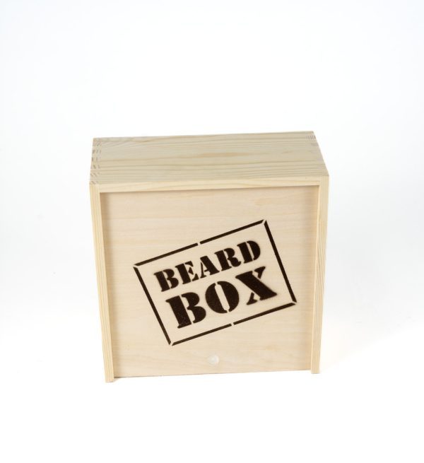 A square wooden box labeled "ADULT GAMBLING NIGHT BASKET" on the front side. The box has a natural wood finish and appears to be a storage or gift box, likely intended for grooming products or accessories related to beard care, perfect for any adult man's nightly routine.