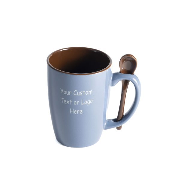 The Spooner Mug - Design your own is a light blue ceramic mug featuring a brown interior and includes a small brown spoon resting in a notch on the handle. The front of the mug displays the text "Design Your Own Text or Logo Here.