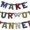 A banner composed of colorful, uppercase letters spells out "MAKE YOUR OWN BANNER" in three rows. The letters come in a vibrant mix of blue, red, green, yellow, and white. Linked together with small fasteners, this Build a Banner - Make your Own Banner Kit lets you create a uniquely personalized banner.