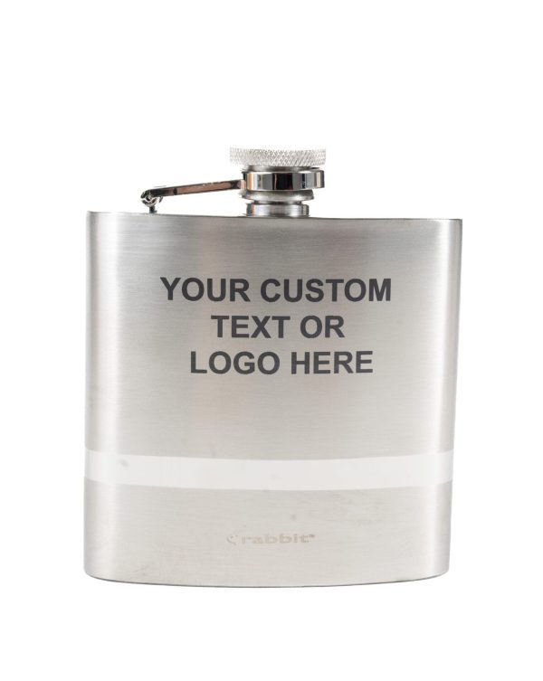 Introducing the Silver Flask - Your Custom Text/Logo Here. This sleek, metallic flask features a closed screw-on cap and is adorned with the words "Your Custom Text or Logo Here" printed in black on the front. It also showcases a small "rabbit" logo at the bottom and includes an elegant white stripe for added style.