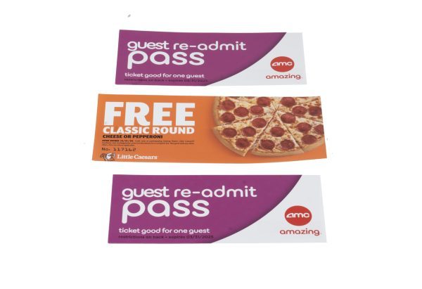 The image showcases three items featured in the Night Out Basket - Pizza & Movies: two AMC guest re-admit passes with a purple background and white text, and a Little Caesars voucher for a free classic round pizza adorned with an image of pepperoni pizza. These passes and voucher, great additions to any evening out, include expiration and usage details.