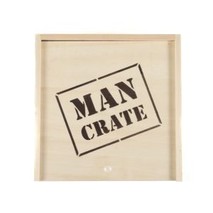 The Man Crate Gift Box is a wooden crate with "MAN CRATE" stenciled in bold black letters on the front, featuring a simple, unfinished look.