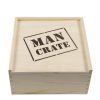 The Man Crate Gift Box features a wooden crate with the words "MAN CRATE" stenciled in black on the top lid. It boasts a natural wood finish and dovetail joints at the corners, with the lid slightly lifted to reveal its contents.