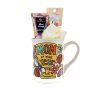 The "Mom of the Year" Mug Gift Basket with Free Food Certificate features a white mug adorned with colorful flowers and "Mom of the Year" written on it. The package includes a body lotion tube, a bath sponge, and a nail file set.