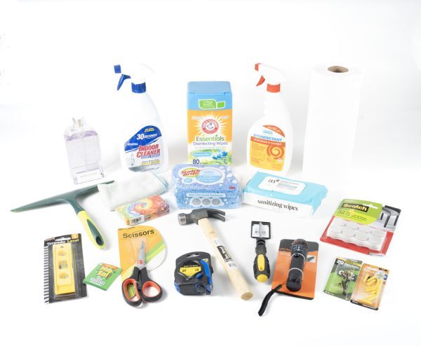 A collection of household cleaning and maintenance items. Includes spray bottles, wipes, soap, paper towels, a sponge, a squeegee, various tools (hammer, scissors, screwdriver, measuring tape), batteries for your flashlight to light up the night, and a pack of replacement blades available in our Adult Gambling Night Basket.