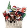 Large Christmas gift basket for dogs featuring plush toys and pet blanket