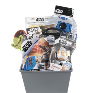 The Star Wars Gift Basket includes a variety of themed items such as a Yoda keychain, BB-8 and R2-D2 toys, stickers, a coloring activity book, and a Star Wars notebook. All these items are neatly arranged in a sleek gray rectangular container.