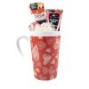 The Valentine's Day Hearts Mug with Free Food Certificate is filled with a bath pouf, a sachet of Yes To brand tomatoes clear skin acne-fighting paper mask, and a packet of Strawberry Crush body lotion. Perfect for Valentine's Day, the items are arranged neatly inside the mug.