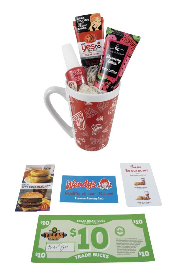 The Valentine's Day Hearts Mug with Free Food Certificate includes skincare products and a snack bar, surrounded by a Wendy's coupon, a Texas Roadhouse $10 voucher, a Chick-fil-A "Be Our Guest" card, and a McDonald's extra value meal certificate. Perfect for Valentine's Day!