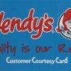 A blue card with the Wendy's logo in red, featuring the name "Wendy's" and a drawing of a smiling red-haired girl. The text below the logo reads "Quality is our Recipe" in red and "Customer Courtesy Card" in white. It's a perfect addition to the "You are my BFF Mug Gift Basket with Free Food Certificate," making it an ideal gift for fast-food lovers.