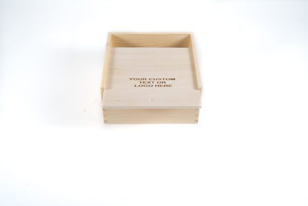 The Wooden Gift Box - Medium Crate features an open lid and is designed for customization. The interior base bears the text "Your Custom Text or Logo Here." This simple, unfinished box is displayed against a white background.