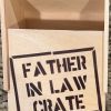 A Father In Law Crate - Wooden Gift Box with the product name "Father In Law Crate" stenciled in black on the front. The empty wooden gift box sits open on a granite countertop, ready to be filled.