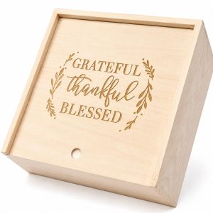 Custom corporate gift boxes made of wood with laser engraved company logo on the sliding lid.