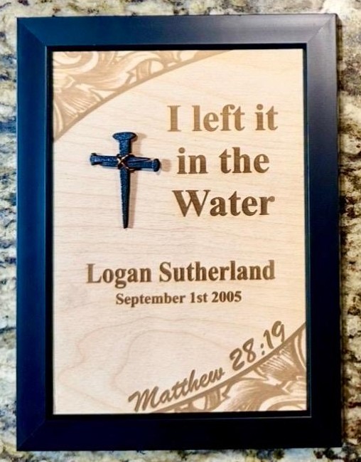 Personalized wooden baptism plaque engraved with baby name and date for a gift.