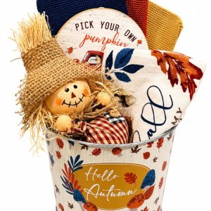 Fall kitchen decor gift basket featuring dishtowels and autumn home accents in a festive tin